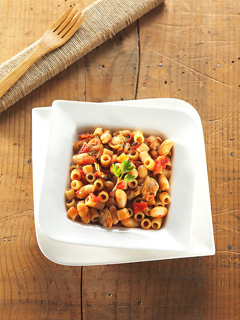 Spelt tubetti pasta with tomato sauce all'arrabbiata, clams and cannelloni beans