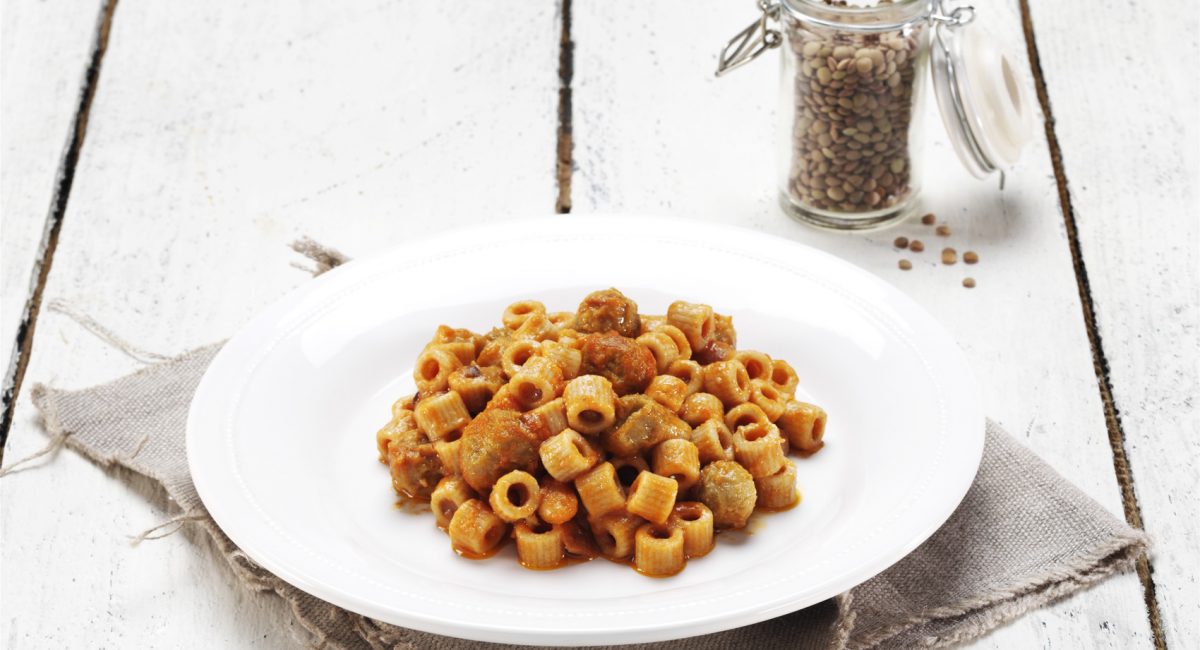 Spelt tubetti pasta with lentil balls and tomato and legume sauce