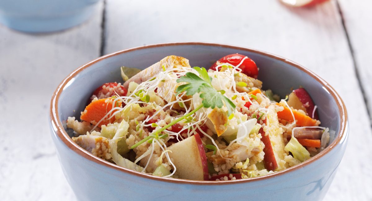 Cous cous with vegetables, chicken and shoots