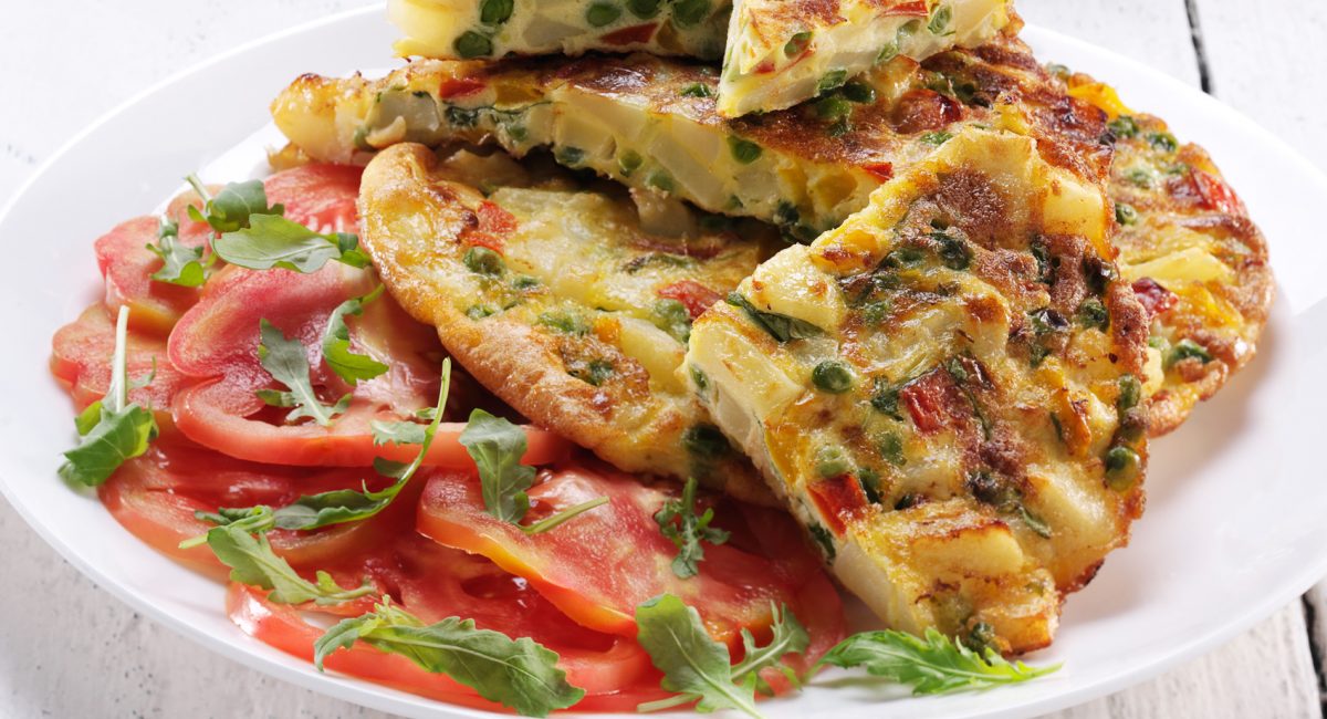 Omelette with eggs, ricotta and tomato carpaccio