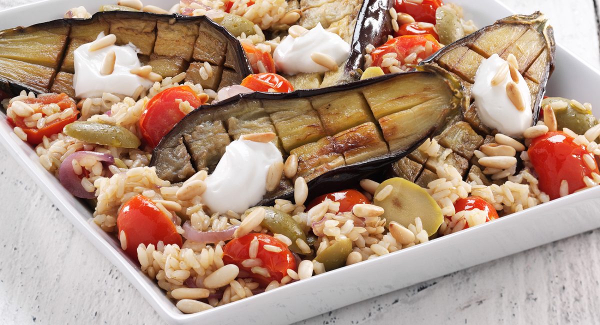 Roasted aubergines with brown rice and cherry tomatoes